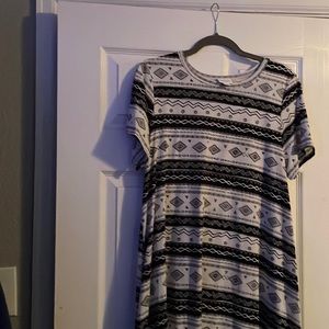 Carly large black and white 95% poly 5% spandex. Excellent shape .